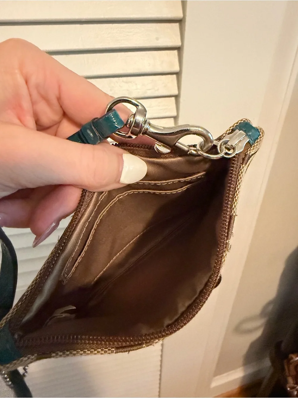Coach two wristlets